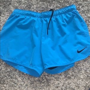 Blue Nike shorts